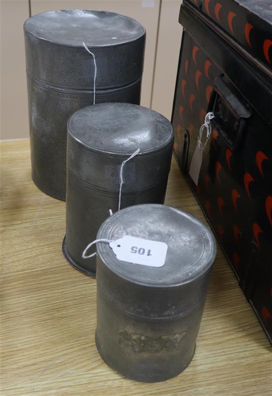 Two Chinese Swatow pewter cylindrical tea canisters and covers and another smaller canister,